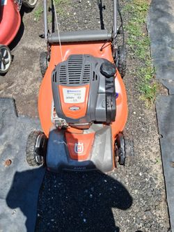 Self-propelled 4 w d Husqvarna mower