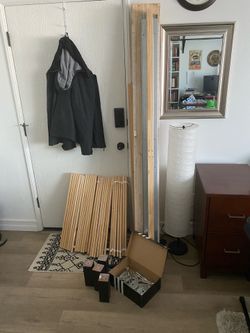Used IKEA queen bed frame  (disassembled )