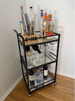 Sleek glass bar cart