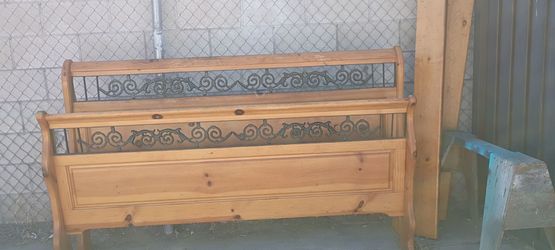 King Bed frame. Solid oak with iron. Complete headboard and footboard. MUST GO NOW!!! 50OBO