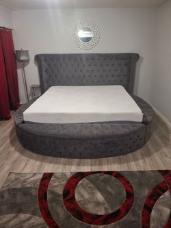 Grey King size round bed