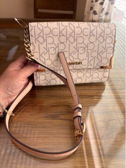 Calvin Klein Monogram Flap Crossbody Bag.