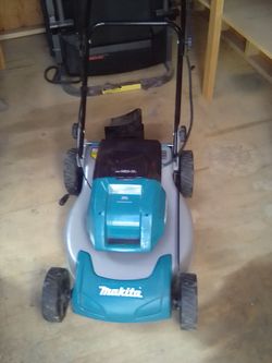 Makita 36v lawnmower 2 18v batteries. Tool only no batteries.