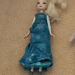 Still Available....Frozen Doll  Plays Music 