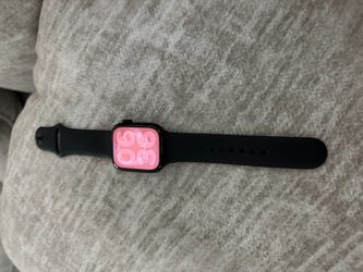Apple Watch Series 11. GPS. 44mm Jet black aluminum case with black sport band.