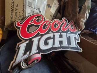 Coors tin sign