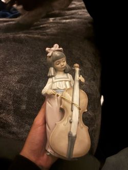 Porcelain Girl Playing Cello Figurine