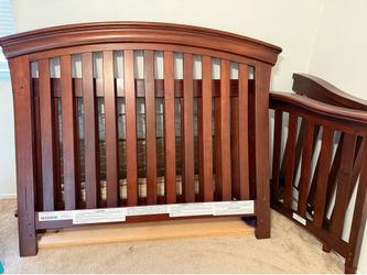 Brown baby crib