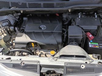 2011 Toyota Sienna 6-cylinder. Silver with only 130,000 miles, current registration, it's the XLE luxury trim, like-new tires.