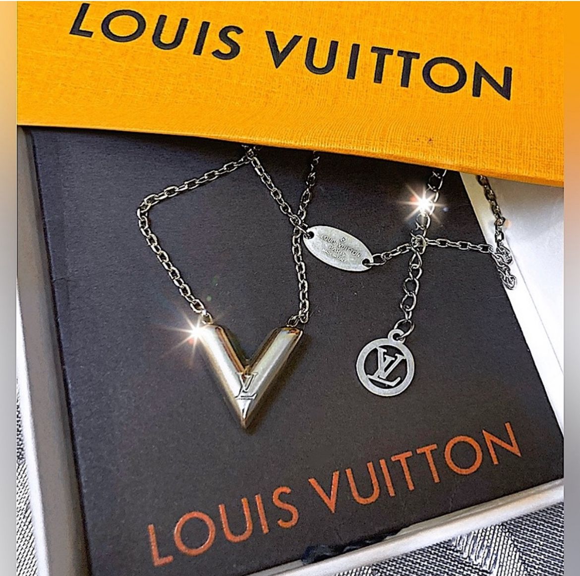 Authentic Louis Vuitton V-Shaped Silver Pendant Necklace