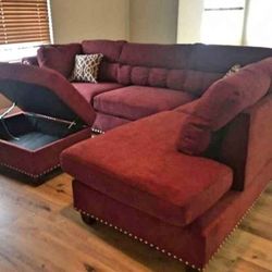 Brand new red Velvet like Sectional Sofa with storage ottoman and 2 accent pillows.