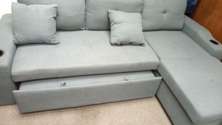 Gray L shaped sofa bed