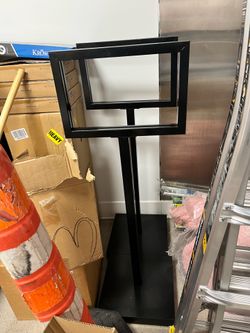 Blk metal metal floor-standing poster sign stand is designed to hold advertising displays and signage