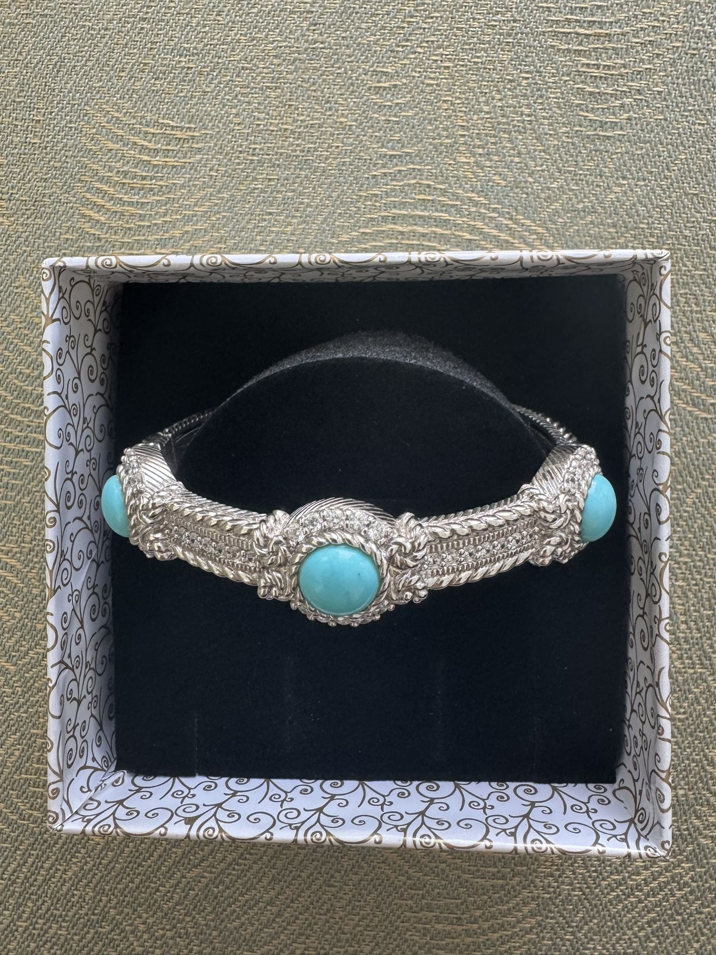 JUDITH RIPKA Turquoise CZ Diamonique STERLING Hinged CUFF BRACELET This stunning cuff bracelet by Judith Ripka is an original piece with a beautiful