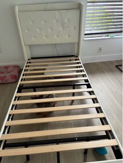 Twin bed with outlet