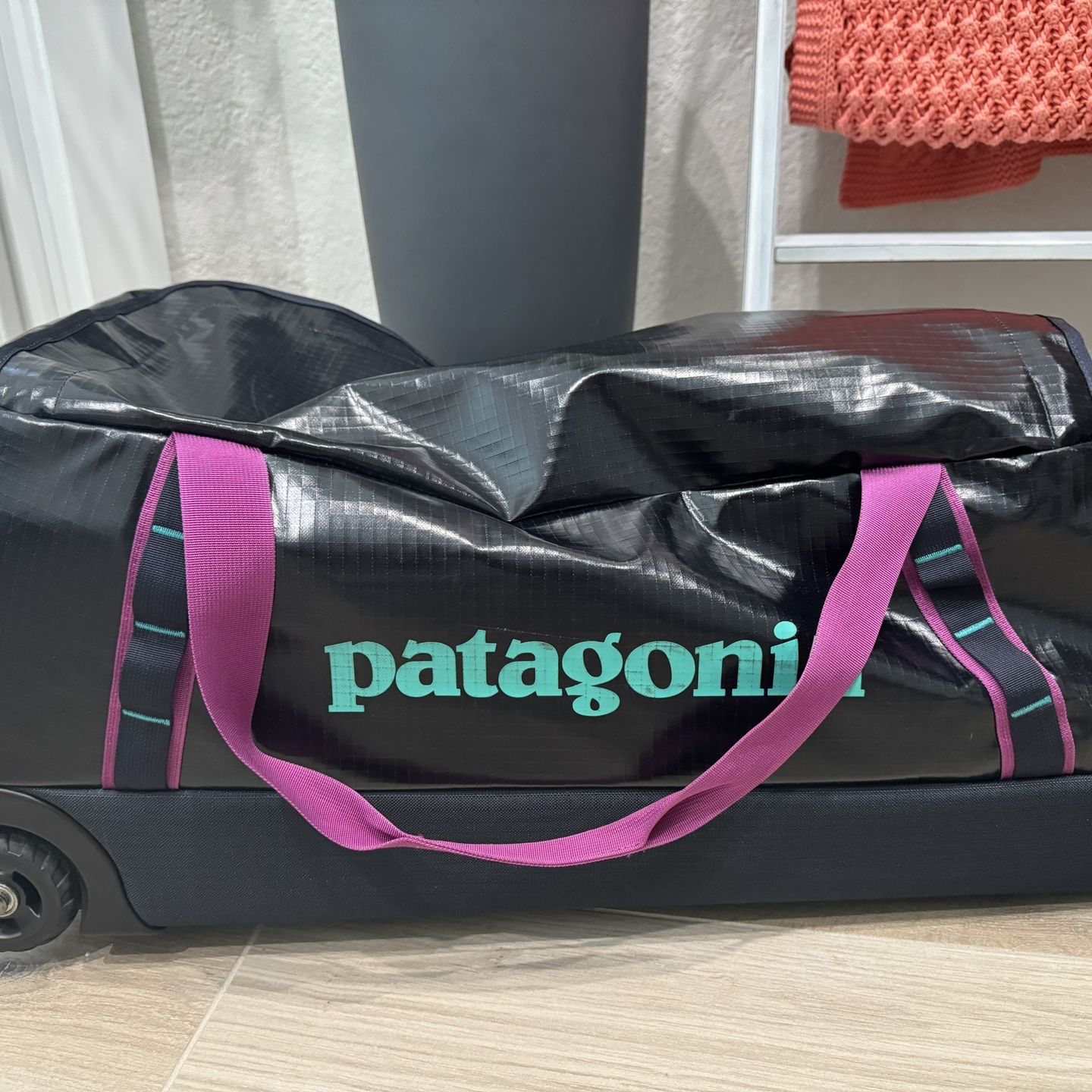 used patagonia black hole 120l Hole Wheeled Duffel 100L Worn Wear film laminate with a sleek matte finish Wheeled Duffel Used Patagonia Duffel