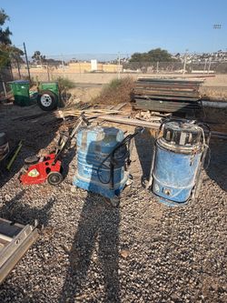 Concrete flooring equipment  2 vacuums  and a floor  scraper