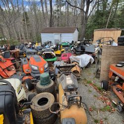Yard Full Of LAWNMOWERS AND Parts