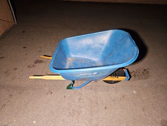 Large plastic tube wheelbarrol