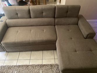 Tan Sofa-Bed 7’ 9” W x 5’ L
