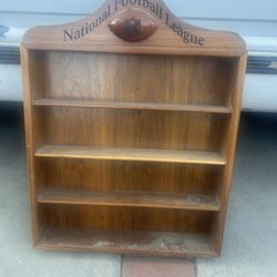 vintage National Football League (NFL) wooden display shelf