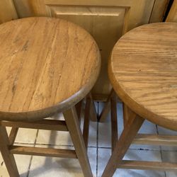 2 wooden stools 24in tall