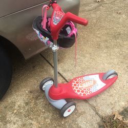 Nice kids western flyer three wheel scooter with helmet only $20 firm