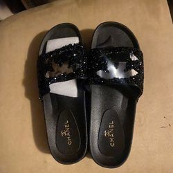 CC Slides, wallet and shades.