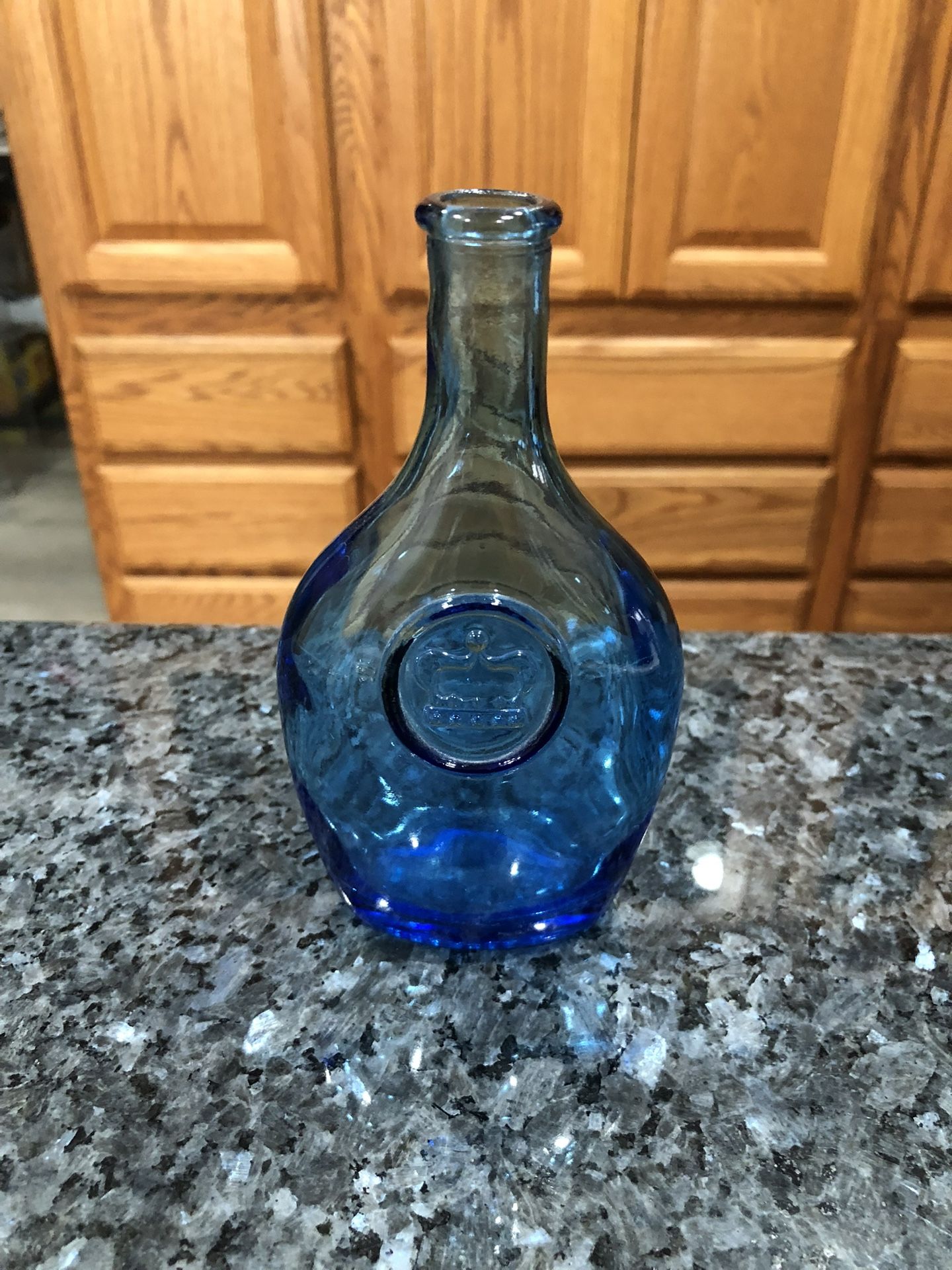 Antique Blue Bottle Glass. Very pretty blue color. Approximate Size 5 1/2 inches tall, 3 inches wide across and 1 1/4 inches in depth.