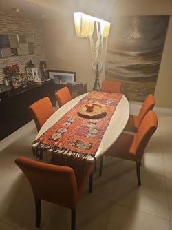 A designed cast marble dining table, suitable for six/eight people.