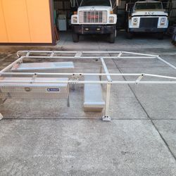 - Aluminum ladder rack with toolboxes