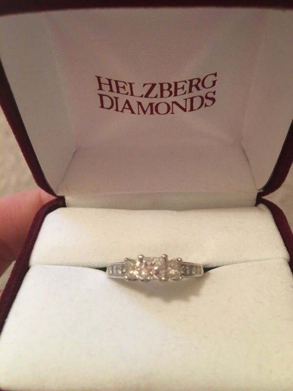 White gold engagement ring & woman's diamond wedding band