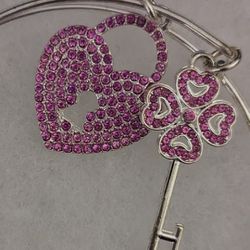 NEW SILVERTONE BRACELET WITH 2 BLING PINK CHARMS 