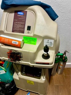 Oxygen refill machine and tanks