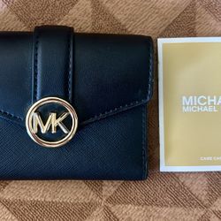 Michael Kors trifold wallet. 