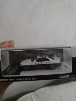 Brand New Inno64 R34 Police Skyline .....Hot Wheel