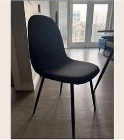Single black chair- new still in box
