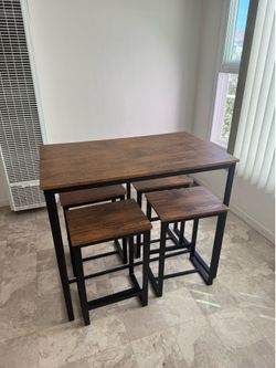 Walnut and Black dining table and stools
