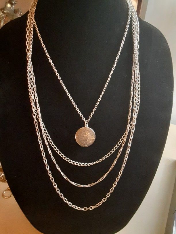 Vintage MULTISTRAND SILVERTONE LOCKET
