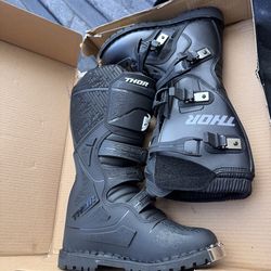 Motorcross boots, helmet and goggles