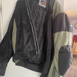 Sedici motorcycle jacket. Green and black. Barely used. Medium. Winter liner that’s removable, and elbow pads.