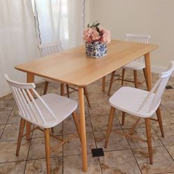 Scandinavian styke light wood birch colored dining table and 4 chairs
