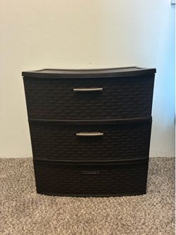 Brown plastic storage organizer.