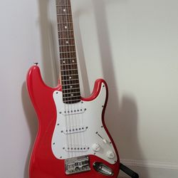 Squier Mini Electric Guitar

W/ Stand