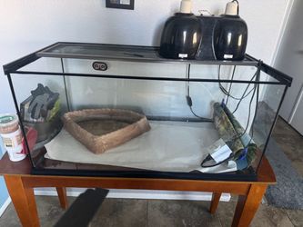 35x18x17 Glass Tank with reptile lights included and a bathing dish