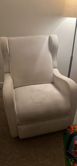Upholstered wingback glider recliner