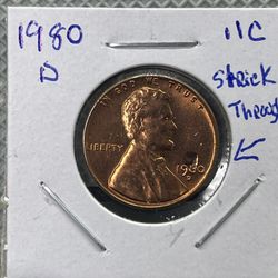 1980 D .01 Penny with Obverse Stike Through Mint Error