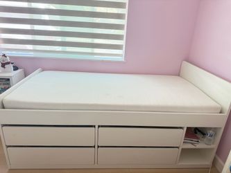 Twin bed with mattress