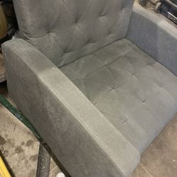 tufted upholstered armchair