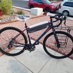 Mongoose men's elroy adventure bike 700c wheel bicycle hotsell